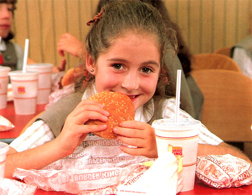 Girl Scout eating at Burger King in the 1980s